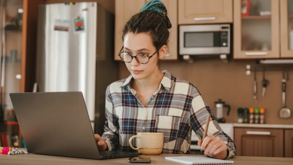 A person working remotely in a cozy home office, highlighting a freelance job setting.