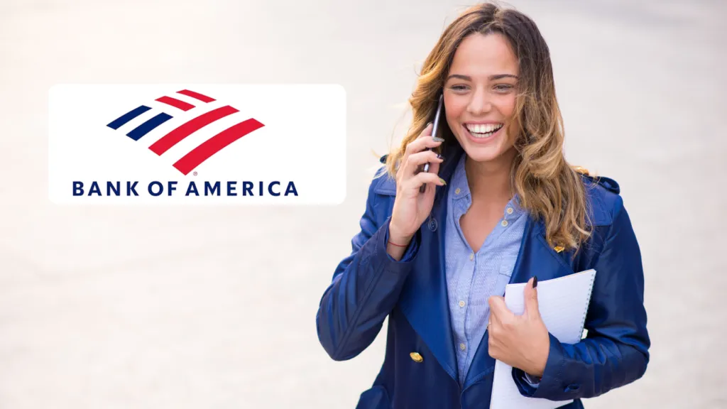 Woman with papers in hands, talking on cell phone and smiling